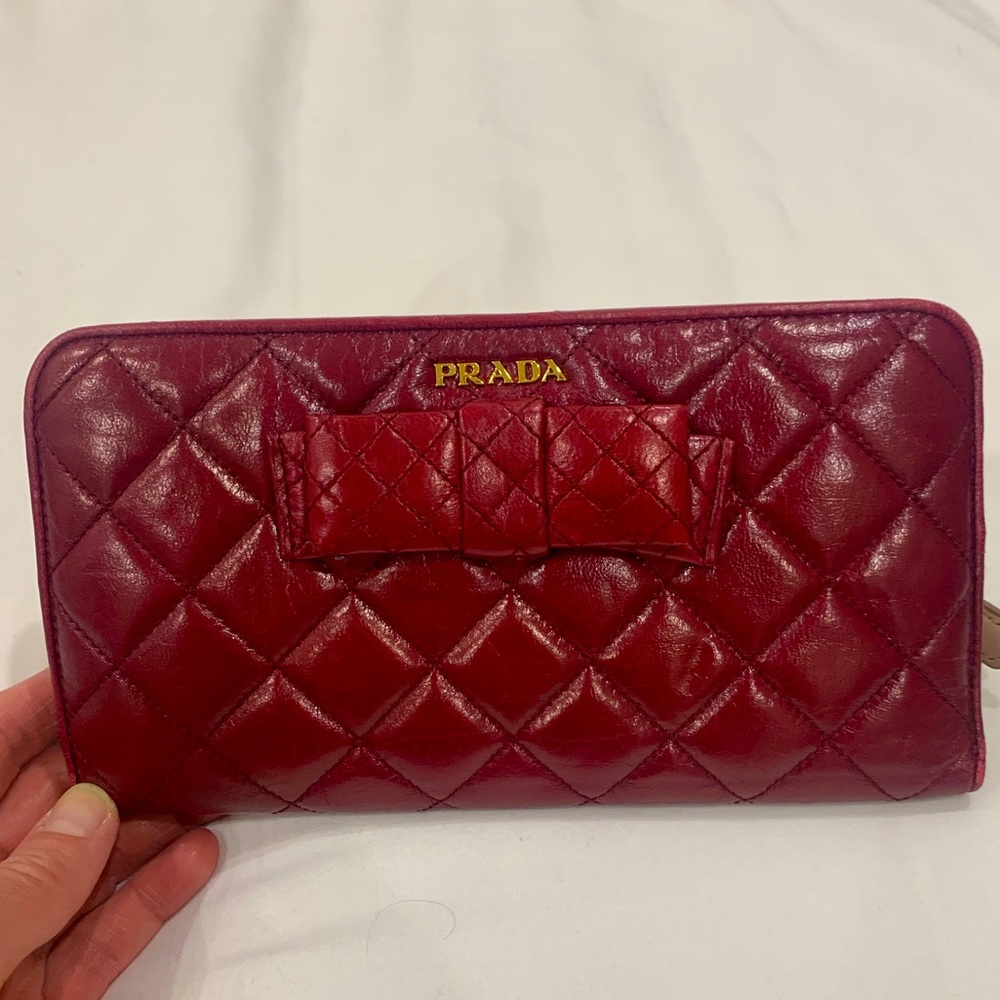 Prada clutch wallet in Maroon.  Beautiful!